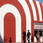 red_and_white_striped_storefront_with_passersby_attrib_to_arthur_stross_around_1970 22